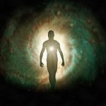 Person in tunnel of light