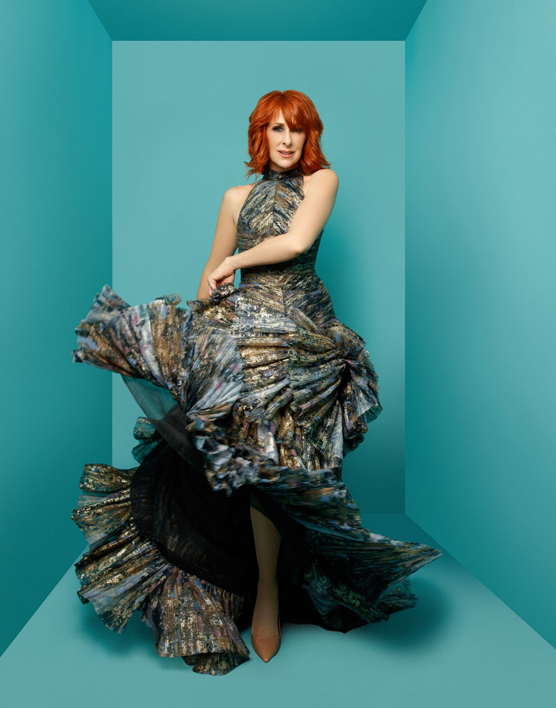 Wendy Braun with teal background